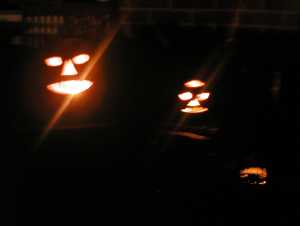 Still life with jack-o-lanterns and iron dog, dark